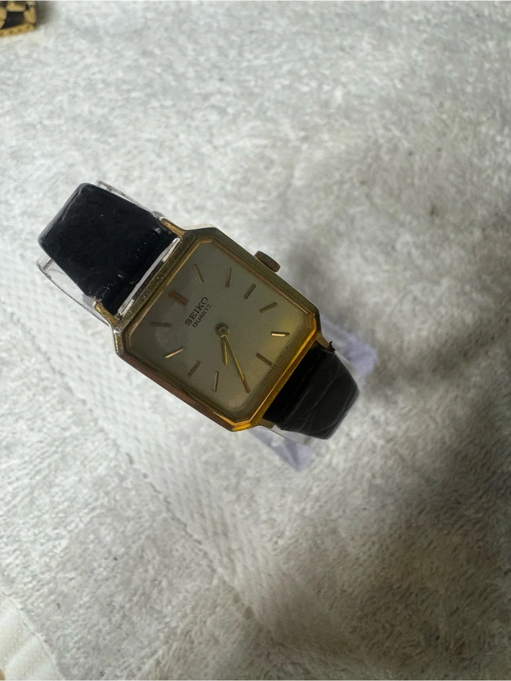 Seiko Gold Tone Square Watch with Silver Dial and Black Strap